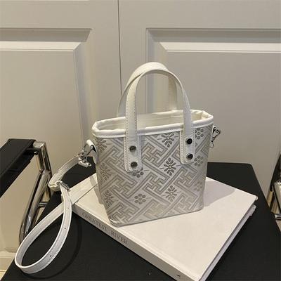 Nieuwe Wanji patroon draagbare bucket bag high-end lichte luxe veelzijdige schouder messenger bag dames