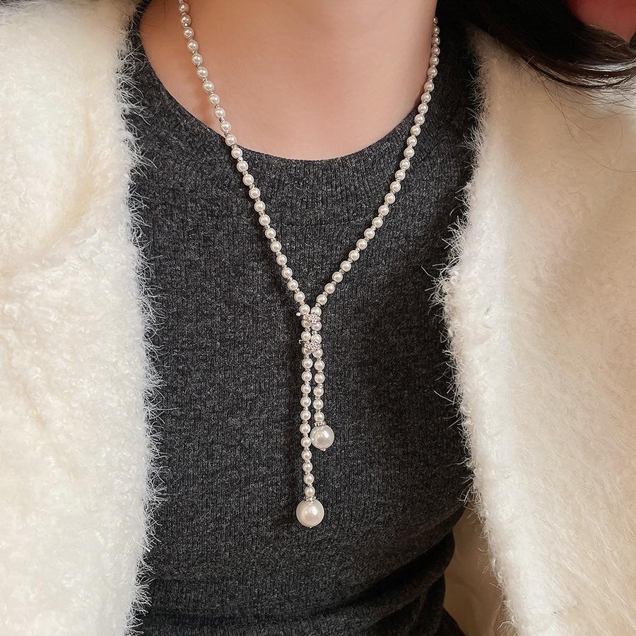 Elegant Minimalist Long Pearl Necklace - French Light Luxury High-End Women's Sweater Chain