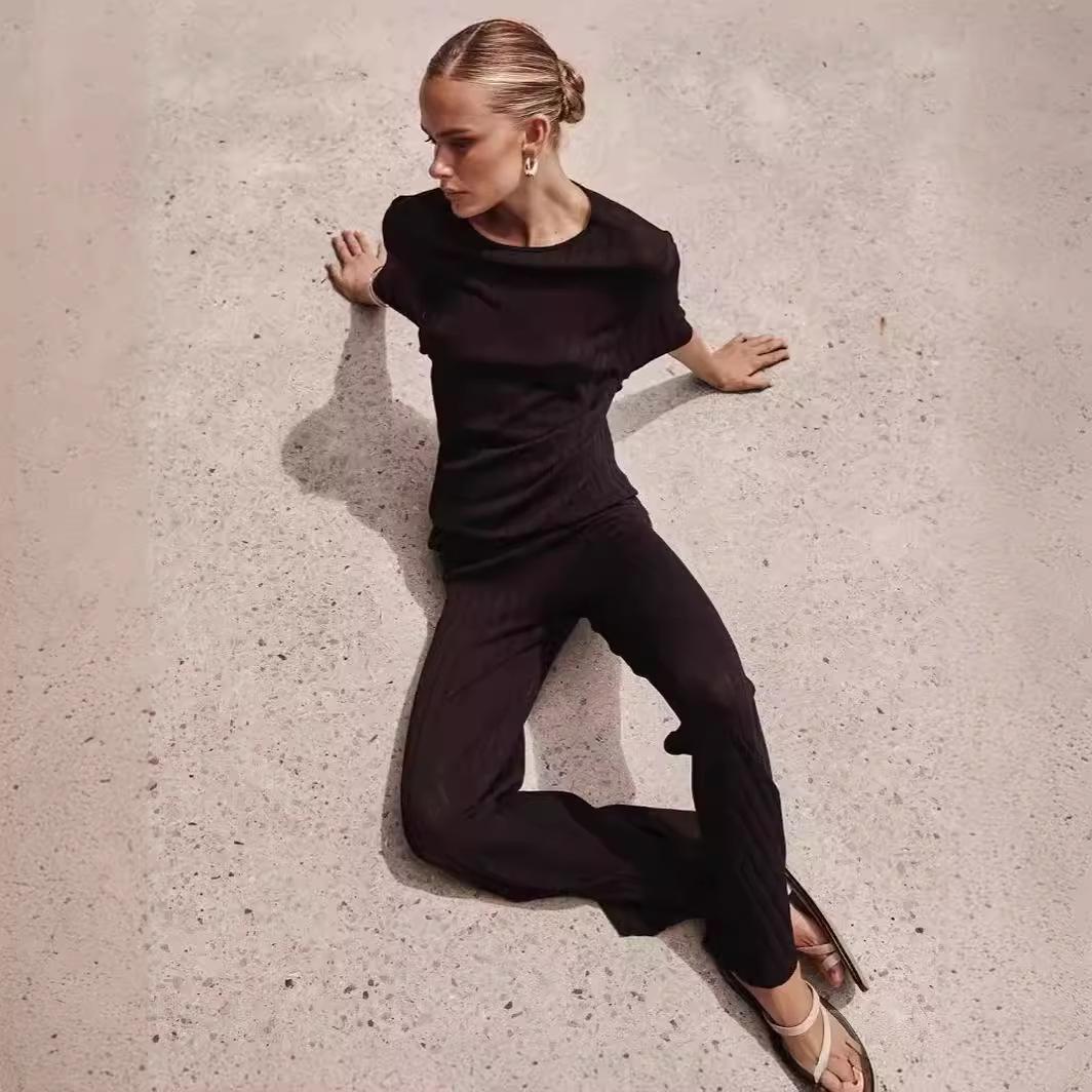 

Женский комплект из двух предметов однотонного цвета в европейском и американском стиле 2024 года: Топ с круглым вырезом и широкие длинные брюки L чёрный