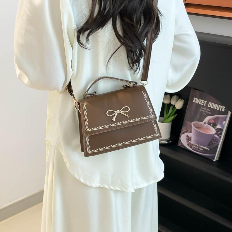 2025 summer new fashion large capacity simple casual texture solid color large capacity bow shoulder messenger bag