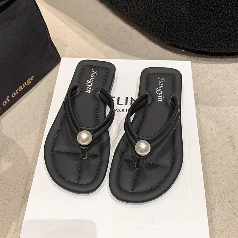 

Шлепанцы женские летние для улицы модные новые нескользящие на плоской подошве с перемычкой для пальцев приморские пляжные сандалии 40 чёрный