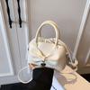 Niche bow small bag women's new hand bucket bag spring and summer retro shoulder messenger bag