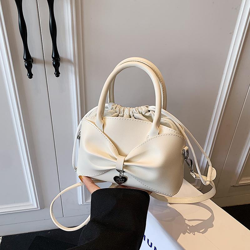 Niche Bow Small Bag Women's New Hand Bucket Bag Spring and Summer Retro Shoulder Messenger Bag