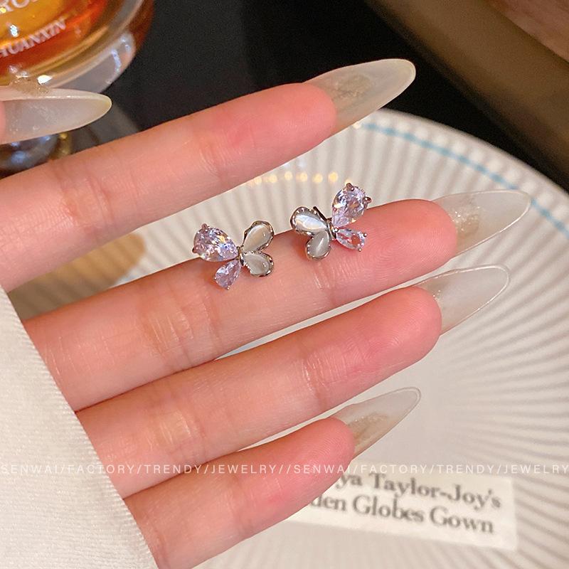 

Korean simple opal butterfly stud earrings female sweet exquisite small earrings temperament earrings