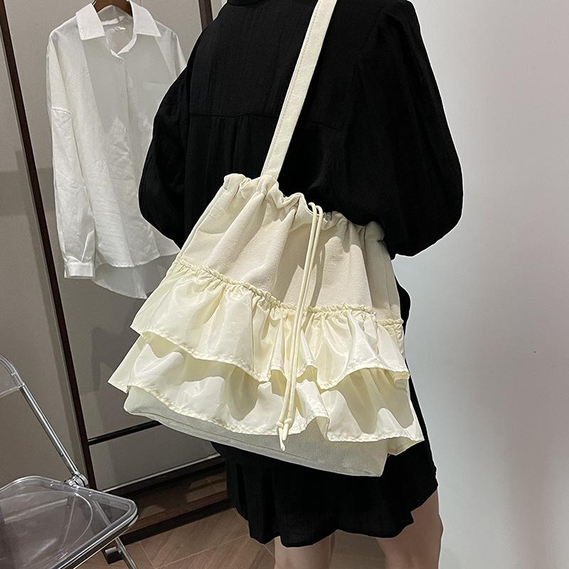

Niche lazy style lace skirt tote bag women s 2025 new high-end feeling foreign style summer underarm shoulder bag tide 33*13*34 бежевый