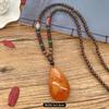 Retro chicken wing wood second generation old beeswax necklace men and women versatile amber pendant long sweater chain pendant