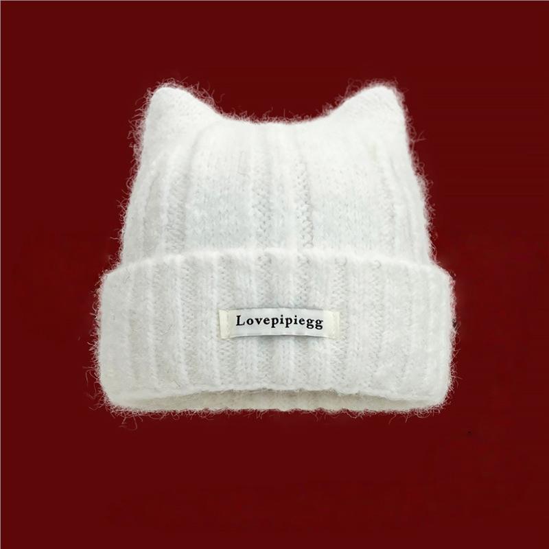 Nouveau bonnet tricoté à oreilles de chat pour l'automne et l'hiver, bonnet chaud en laine pour femme, met en valeur le visage, petits protège-oreilles, bonnet en laine polyvalent et mignon