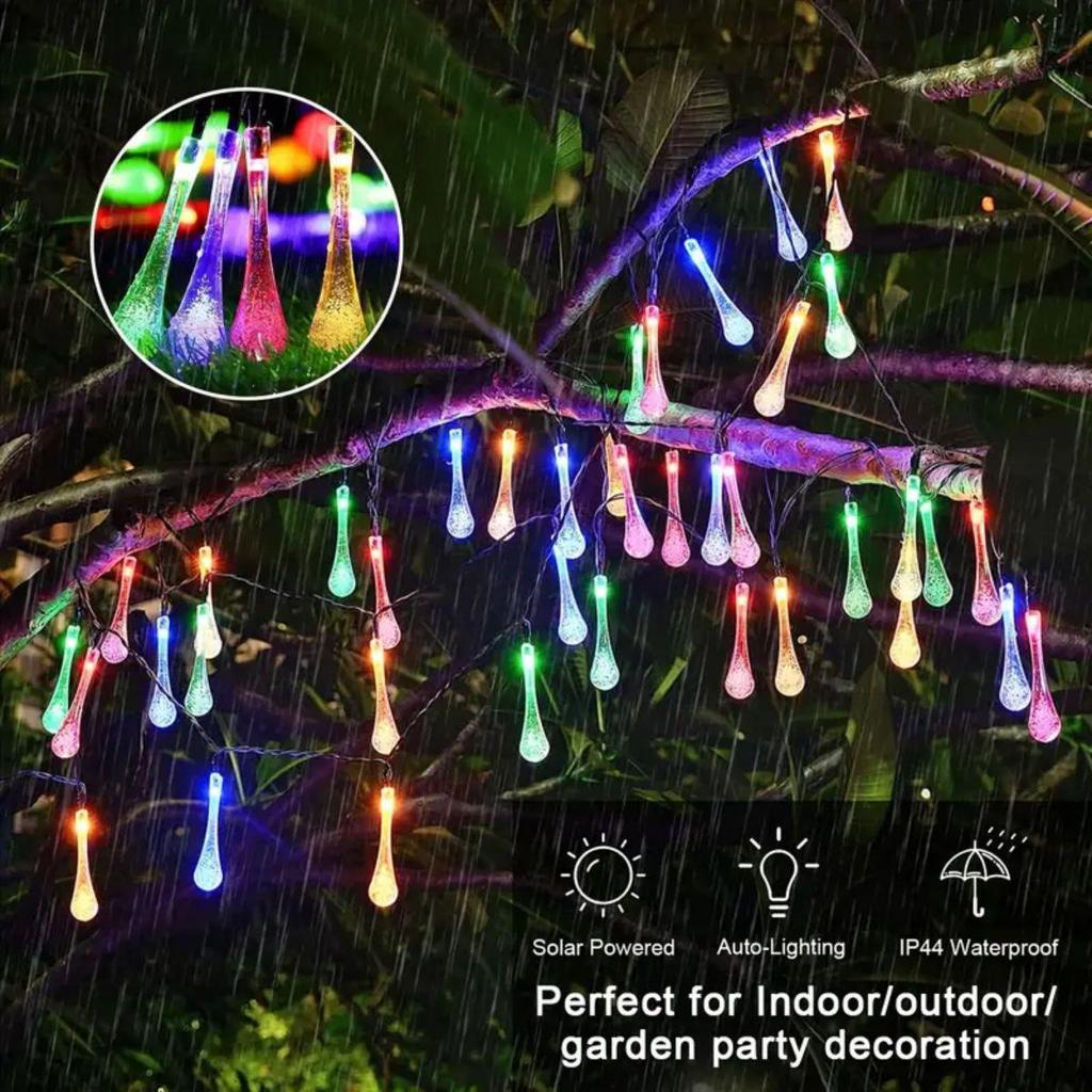 Solar LED Water Drop String Lights: Colorful, Moisture-Proof Decorative Lighting for Festivals, Hotels, and Courtyards with Ground Plug Feature.