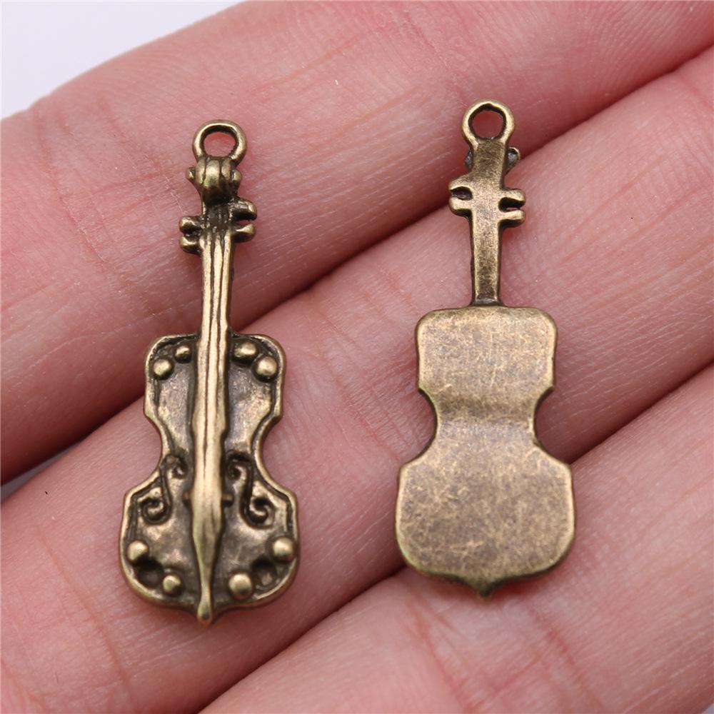 10 sztuk zawieszek muzycznych Instrumenty muzyczne Gitara Bęben Fortepian Mikrofon Zawieszki do tworzenia biżuterii