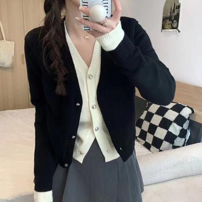 Spring and Autumn New V-neck Fake Two Pieces Design Sense Chic Soft Waxy Knitted Cardigan Fashion Coat Sweater Women