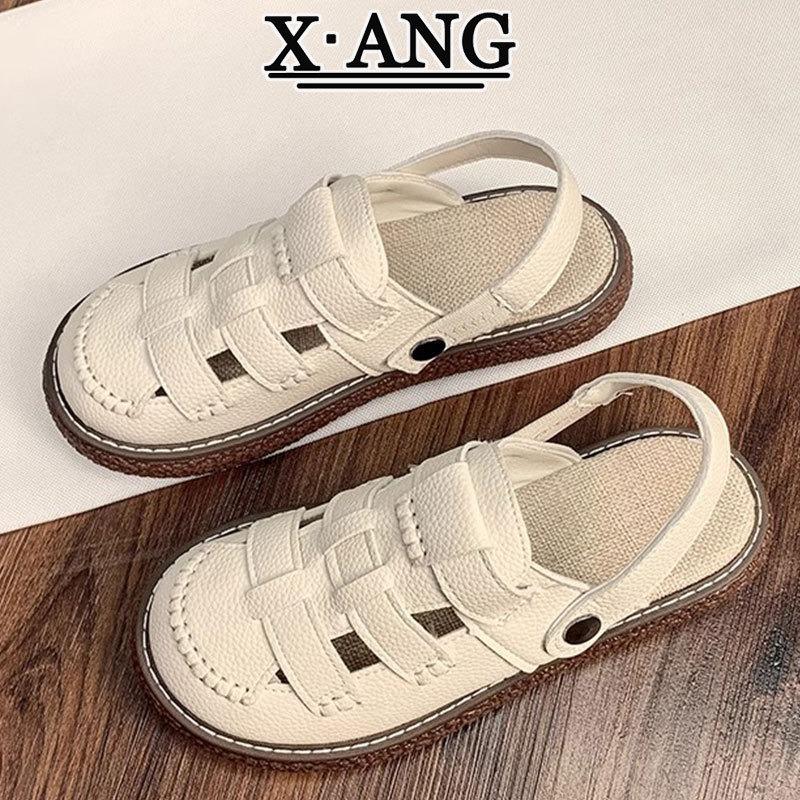 Ledertasche Kopf Sandalen Damen Sommerkleidung dicksohlige Halbpantoffeln neue gewebte Schweinekäfigschuhe Lochschuhe