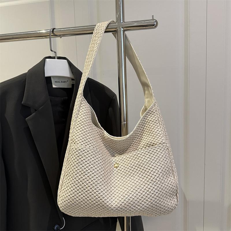 Summer travel seaside beach vacation 2025 straw commuting shoulder knitting large capacity tote bag premium sense