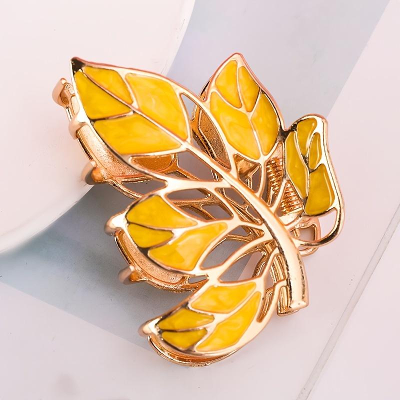 

Hot-selling hair accessories women colored metal leaves grab the back of the head ball head clip all the ponytail hair claw