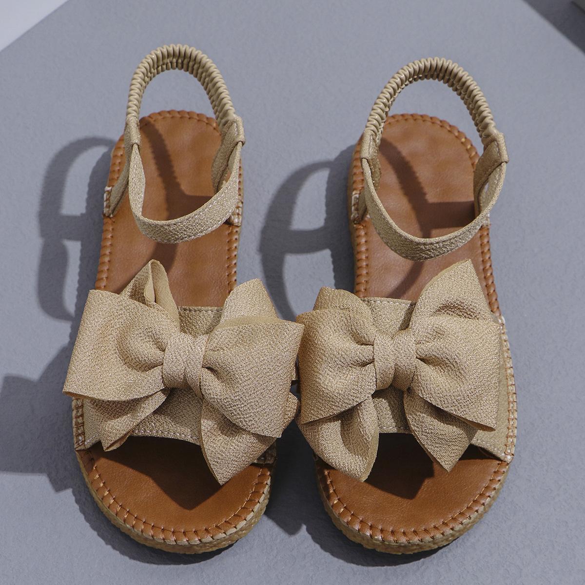 

Женские стильные розовые сандалии на плоской подошве с бантом — легкая повседневная летняя обувь с эластичной резинкой, без застежек и удобной резиновой подошвой 39 бежевый