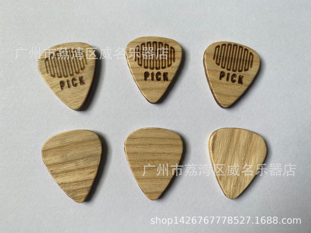Electric and Wooden Guitar Picks: Thumb, Index, and Acoustic Options
