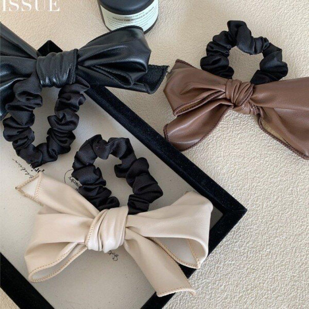 

Кожаная резинка для волос Mno mood beige