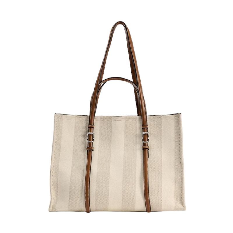 

Large-capacity Canvas Bag Female Contrast Retro Portable Tote Bag Commuting One-shoulder Messenger Bag in Class