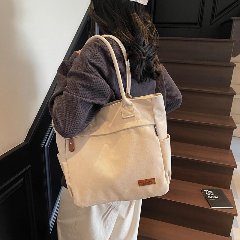 Casual large-capacity canvas bag women's new fashion commuter versatile shoulder bag college student tote bag