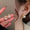 High-End Luxury Metallic Pearl Cross Stud Earrings - Chic, Versatile, Niche Design