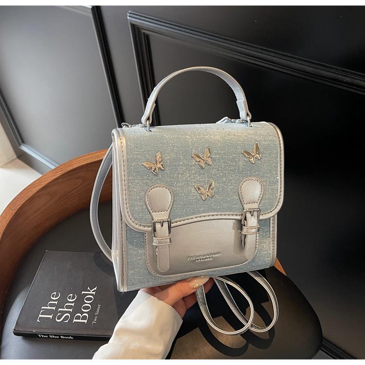 

Casual small butterfly portable backpack women s new niche design texture shoulder bag crossbody small square bag небо синє кольору