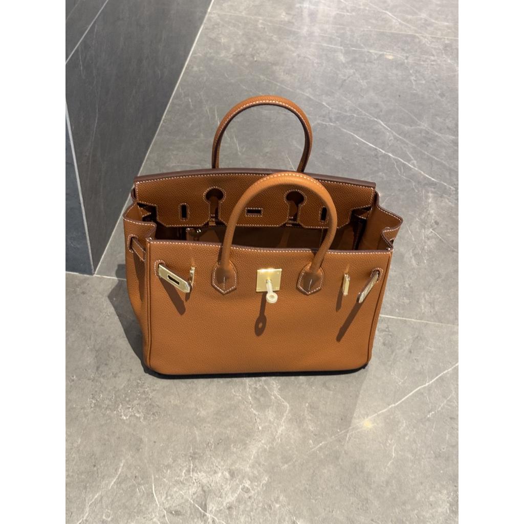Borsa di alta qualità togo con motivo litchi color platino moda europea e americana borsa a tracolla messenger borsa a mano transfrontaliera donna