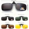 A pair of stylish four-piece flip-on polarized night vision sunglasses with an anti-glare mirror coating, ideal for driving.