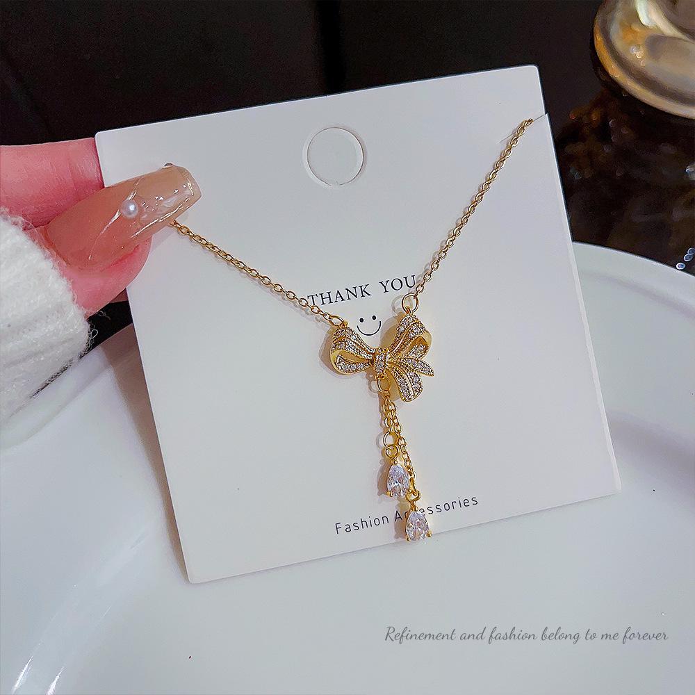 Titanium Steel Bow Tassel Luxury Necklace