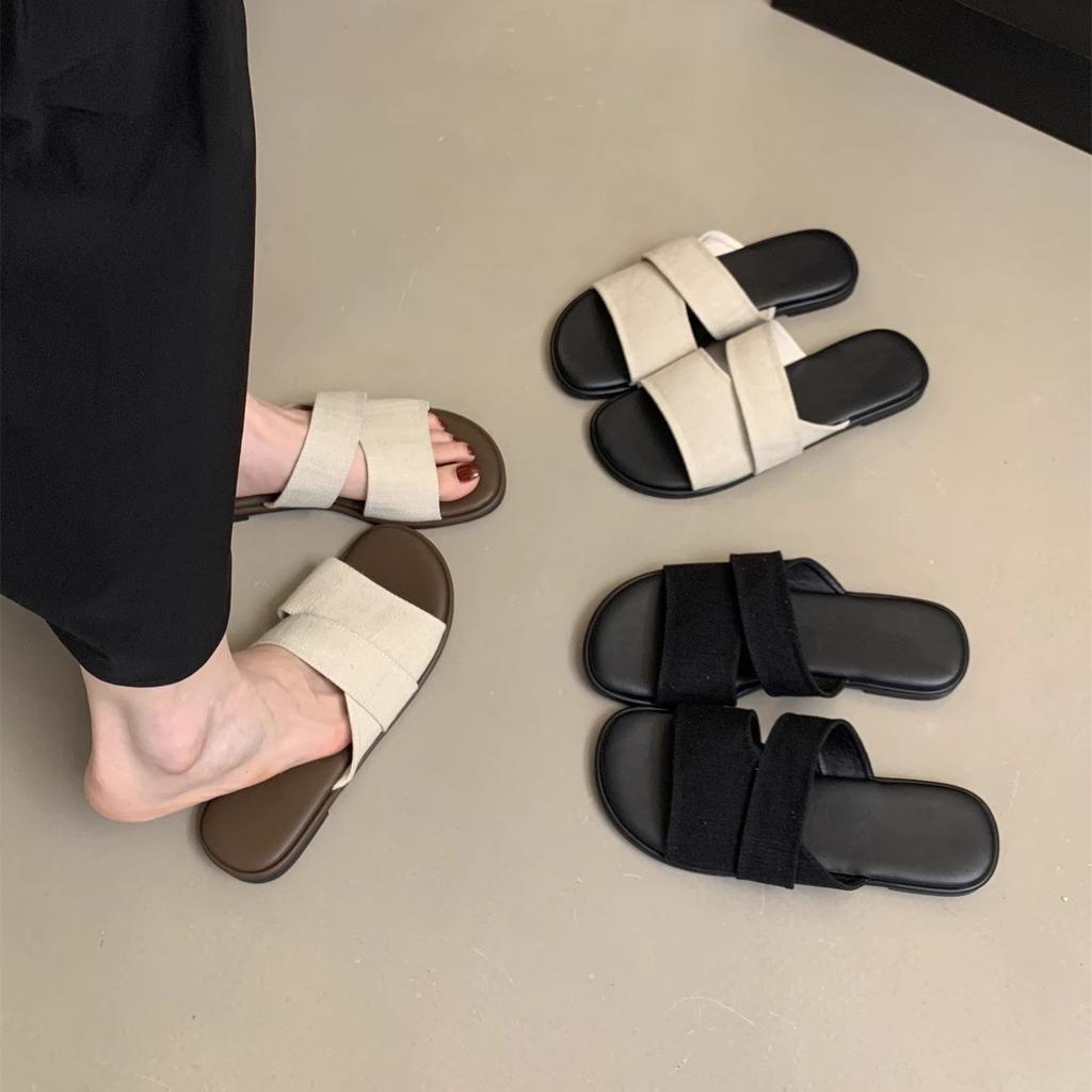 Flat-bottomed slippers women's summer wear new simple casual lazy seaside vacation wind one-word beach shoes