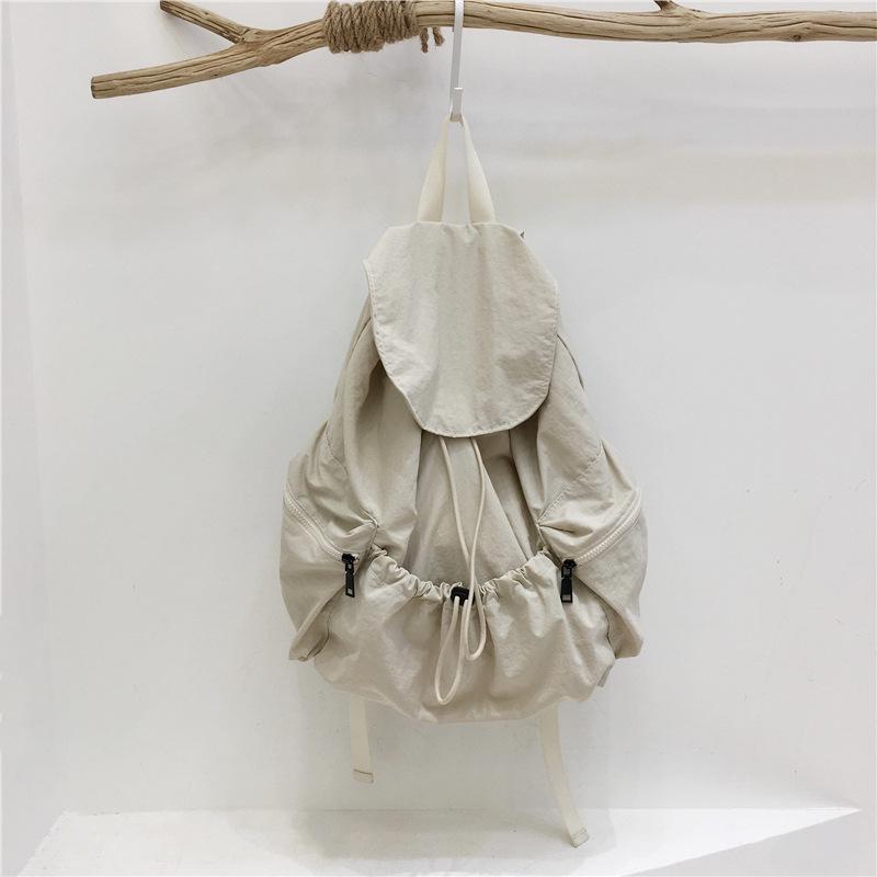 Introducing the New Simple Nylon Drawstring Backpack: a Spacious, Versatile Bag Perfect for Students, Leisure Trips, and Sports Activities.