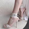 Zapatos de mujer 2025 Verano Sandalias de encaje con tira al tobillo Nueva correa con hebilla Tacones súper altos y finos Sandalia de tacón sexy para fiestas y bodas