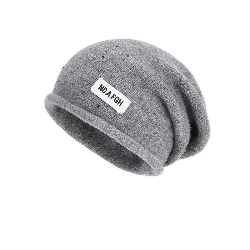 Curled head hat women's autumn and winter outdoor warm ear protection knitted wool hat showing face small versatile pile hat