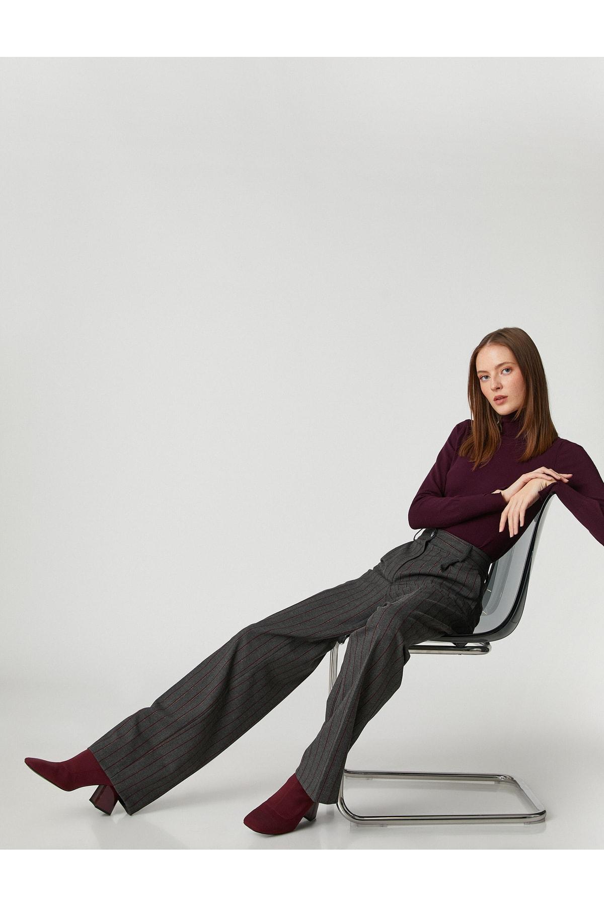 

Брюки Палаццо с пуговицами..