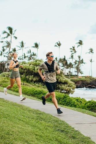 Gilet de course Spigen, Léger et confortable pour une utilisation en extérieur, Convient aux appareils jusqu'à 6,9 pouces, Comprend de petites poches pour organiser les articles de course, Réfle