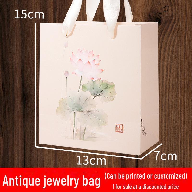 

Подвеска и брошь «Лотос» в подарочной коробке с чехлом для браслета или ювелирных изделий