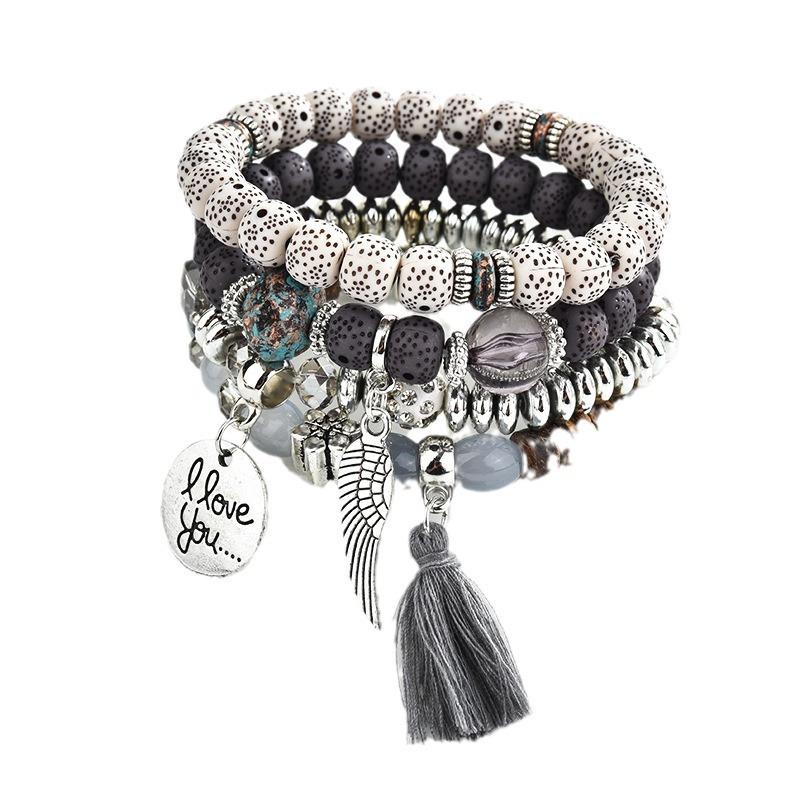 New Crystal Multi-layer Contrasting Turquoise Bracelet Wing Alloy Tassel 4-piece Set