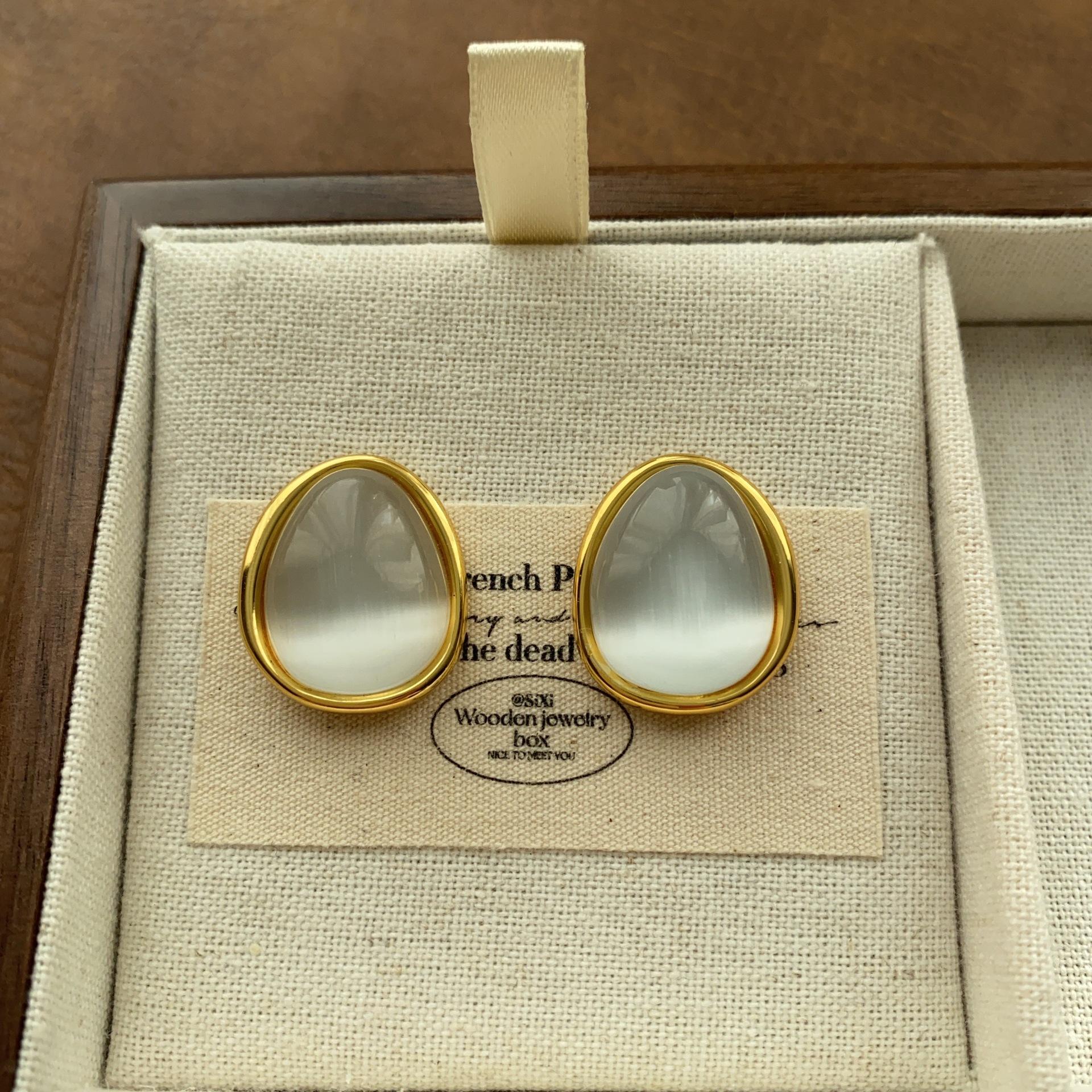 Soft drop-shaped opal stud earrings, elegant and delicate earrings.
