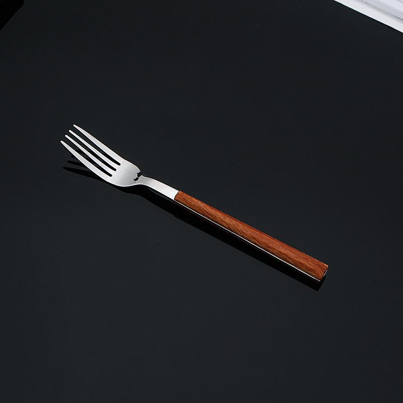 

Stainless Steel Cutlery Set with Wood Grain Handles: Steak Knife, Fork, Spoon, Dessert Spoon, and Fork.