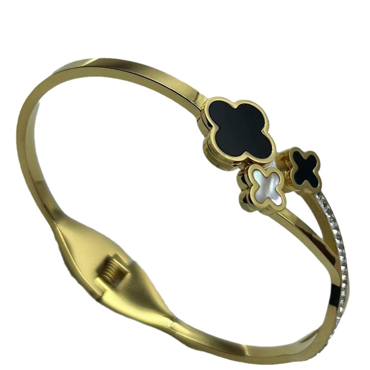 

Универсальный модный дизайн, черно-белый браслет Beimu из титановой стали с четырьмя листьями травы золотой