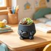 Sød Smilende Ansigt Planteholder, 3D Printet Læsende Hoved Planteholder, Siddende Figur Med Bog Og Kop Plante Pot til Sukkulenter Kaktus Skrivebordsdekoration