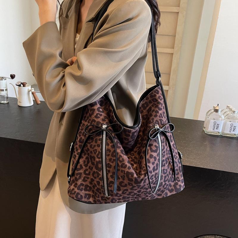 College Style Large Capacity Bow Women 2025 New Autumn and Winter Popular Leopard Print Double Shoulder Back Single Shoulder Messenger Bag