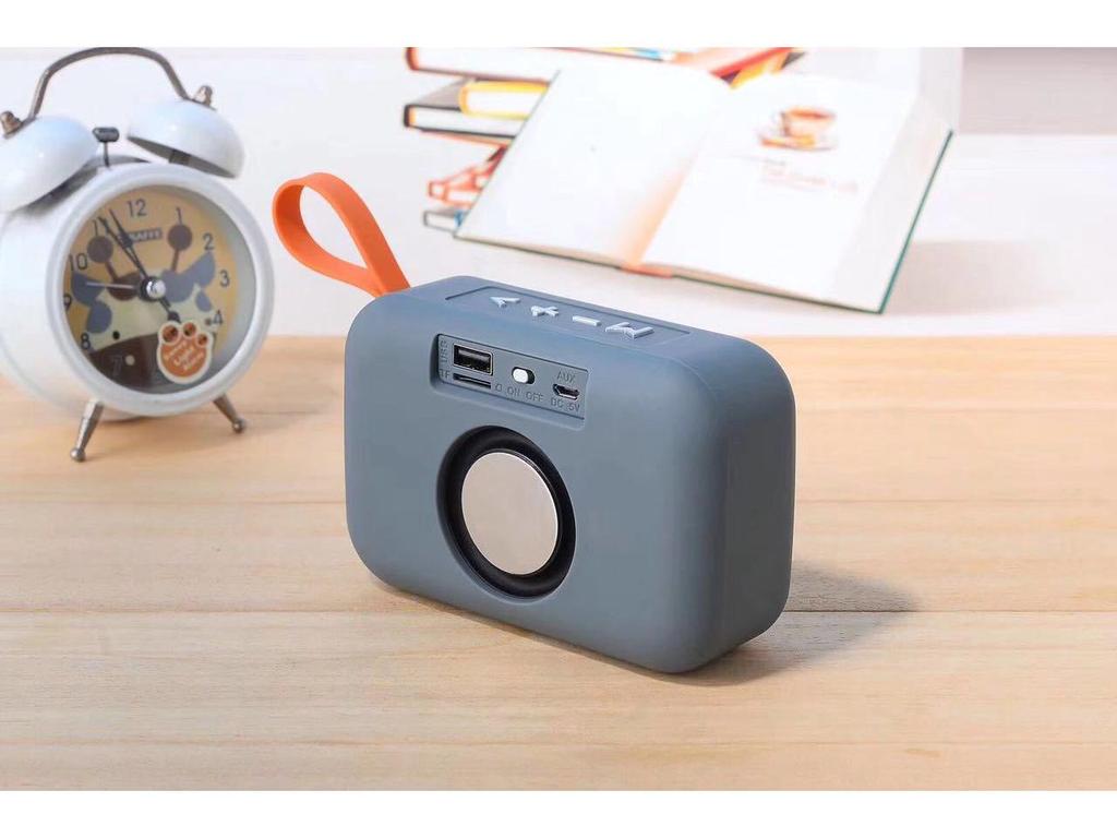 TG506 Portable Bluetooth Speaker with Heavy Bass, Subwoofer, Card Slot, USB Flash Drive, Radio, and Outdoor Charging Capability.