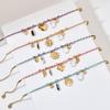 Woven Rope Bracelet with Sun Heart Stainless Steel Pendant - Multi-Element Combo, Fashionable & Personalized Design.