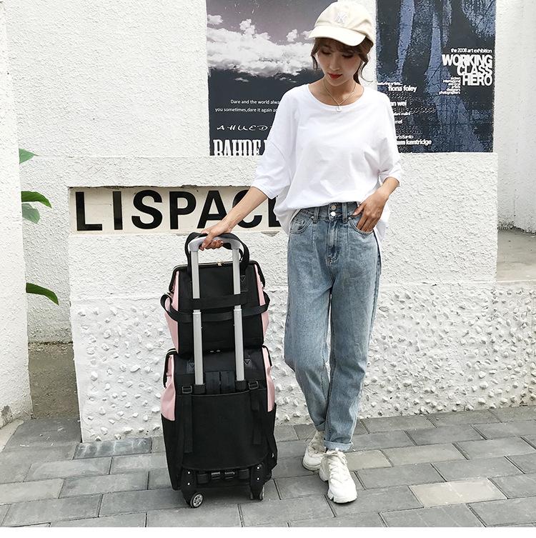 Lightweight Universal Wheeled Backpack: Large Capacity, Double Shoulder, Handheld, Travel-Friendly Luggage Bag