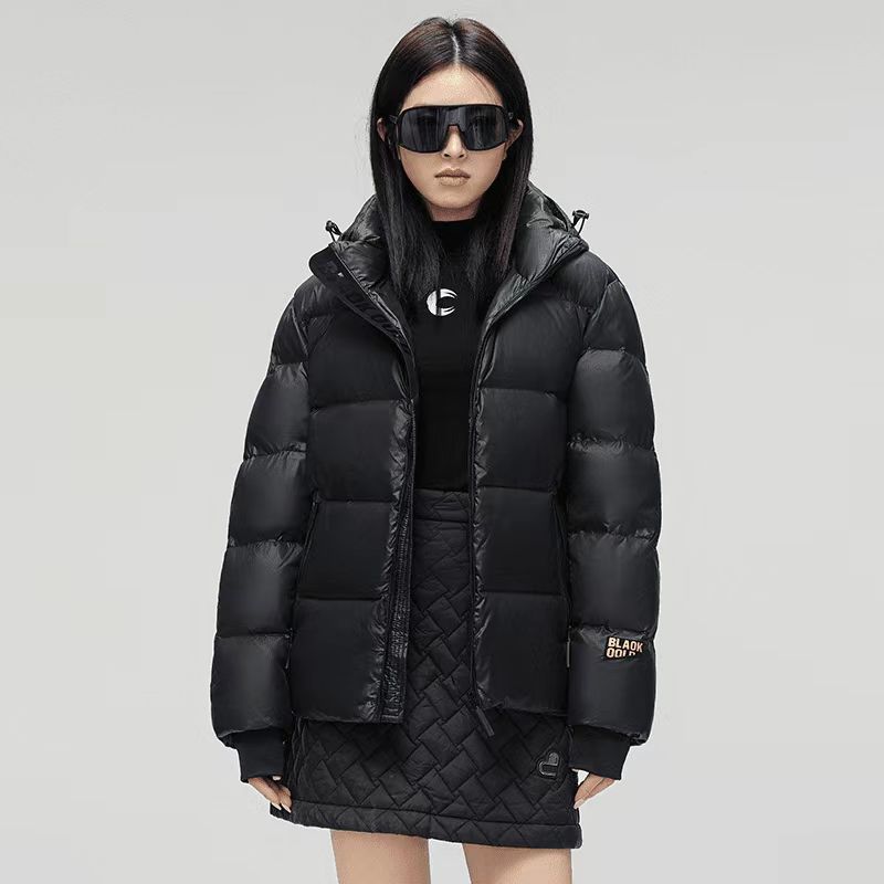 Høst- og vinter Svart gull dunjakker for menn og kvinner, fasjonable løse fortykkede jakker og jakker