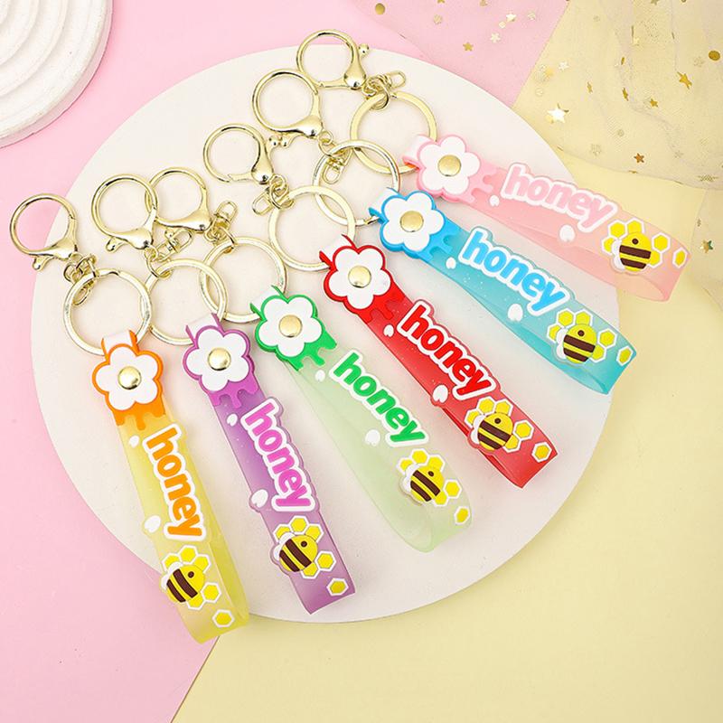 Transparent Pvc Soft Rubber Rope Keychain English Small Flower Jelly Color Plum Blossom Candy Color Drop Adhesive Wristband
