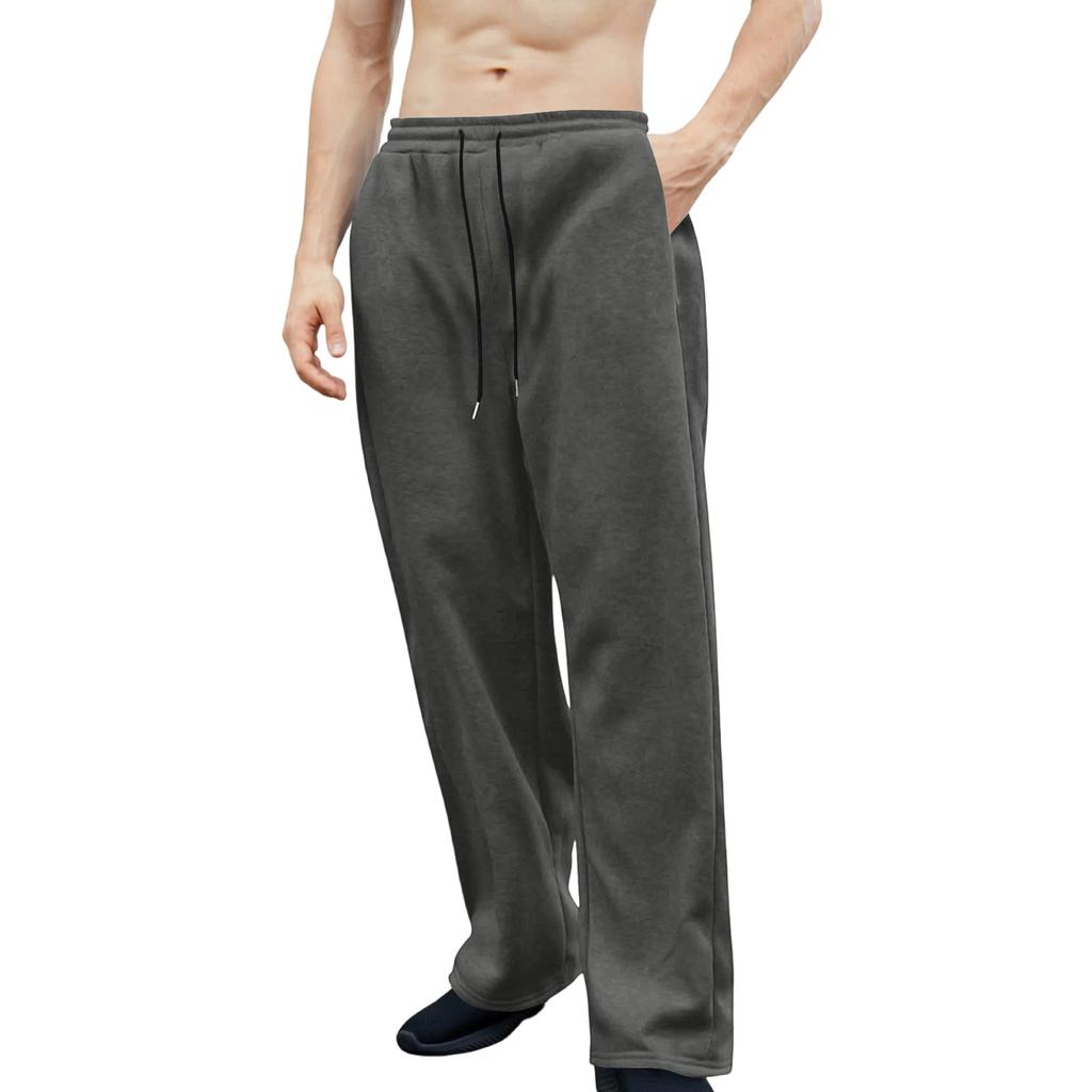 Pánské tepláky s elastickým pasem, rovný a široký střih, volný střih, s kapsami v pase.