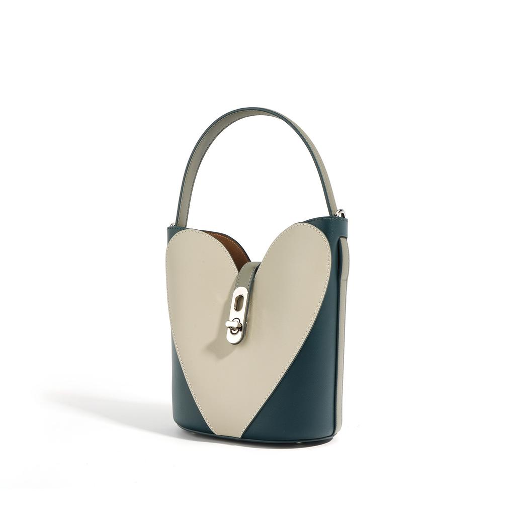 New color matching cowhide shoulder bag niche texture bag popular messenger bag genuine leather hand carry bucket bag commuter bag