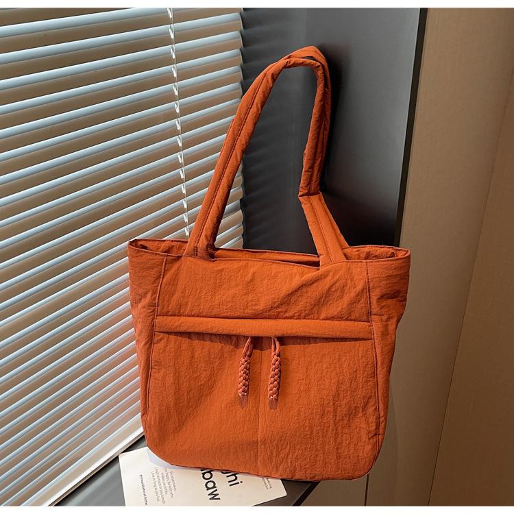 

Large capacity tote bag new casual simple niche fashion versatile underarm shoulder bag commuter canvas bag оранжевый