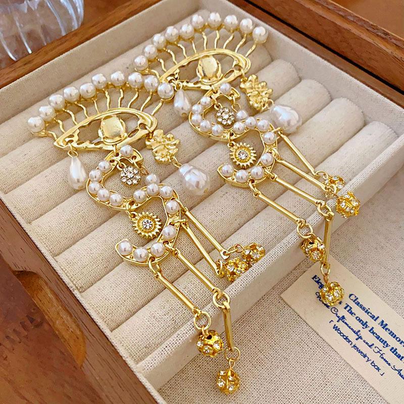 Eingesetzte Strasssteine Übertreiben Augen Ohrringe für Frauen Temperament Hängeohrring Perlenquaste Leichter Luxus Party Zirkon Geschenke