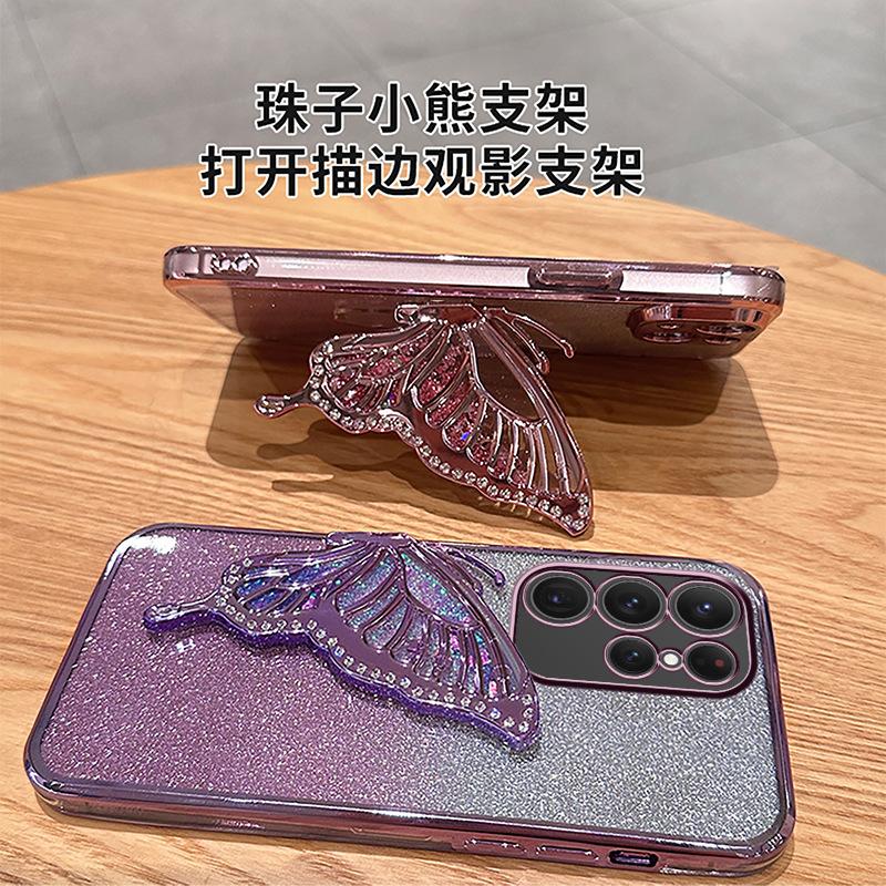 Applicable to Samsung S25ULTRA mobile phone case A05 electroplating glitter NOTE20 diamond-encrusted quicksand butterfly bracket A53 set